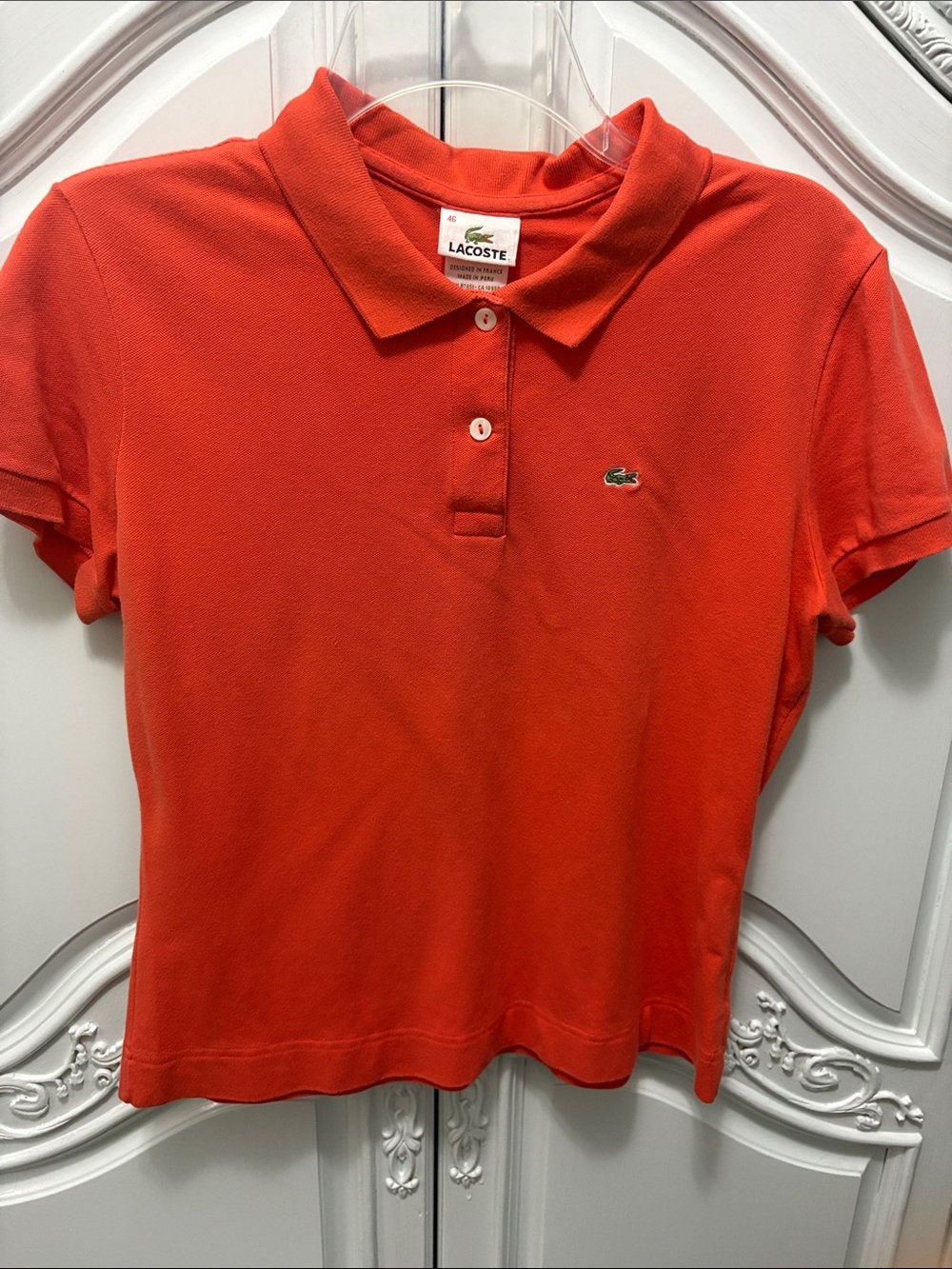 Lacoste Women's Short Sleeve Polo in Vibrant Orange-Red - size 46 European